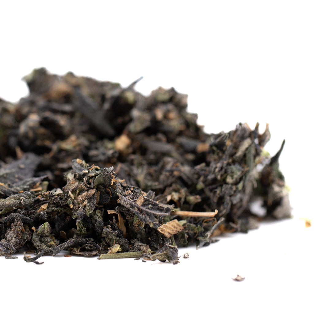 Chunky Monkey Indoor Trim Wholesale 1LB featuring a pile of loose leaf tea and THCA trim