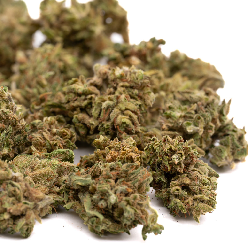 Maverick CBD Hemp Flower with green and brown hues covered in trichomes, Oregon CBD flower