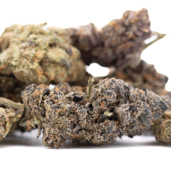 Sour Pears THCa flower bud with green-purple hues and trichomes